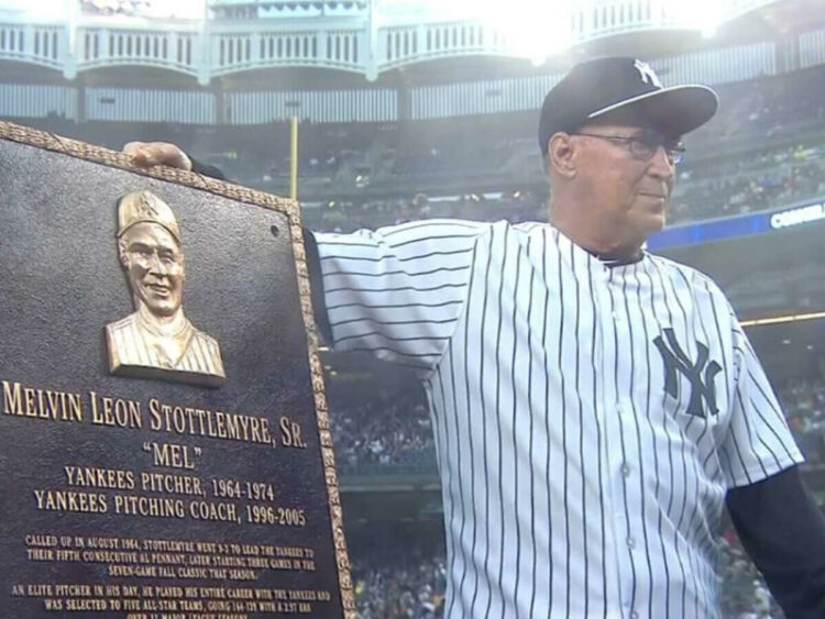 New York Yankees legendary pitcher Mel Stottlemyre is with his plaque at Old-Timers' Day, June 20, 2015, New York.