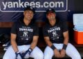 New York Yankees' Giancarlo Stanton and Anthony Volpe in dugout during the 2026 spting training camp. Tampa, FL.