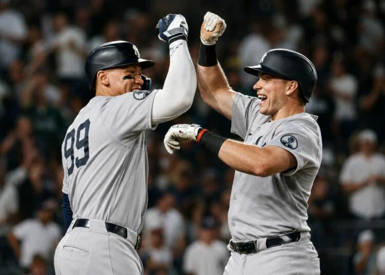 Ben Rice celebrates with Aaron Judge after hitting a home run in the Yankees' 8-2 rout of the A's in Sacramento, May 29, 2026.