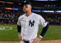 Aaron Judge looks at as the famous phrase of John Sterling was played as a tribute after the Yankees 12-1 win over the Orioles. May 4. 2026, New York.