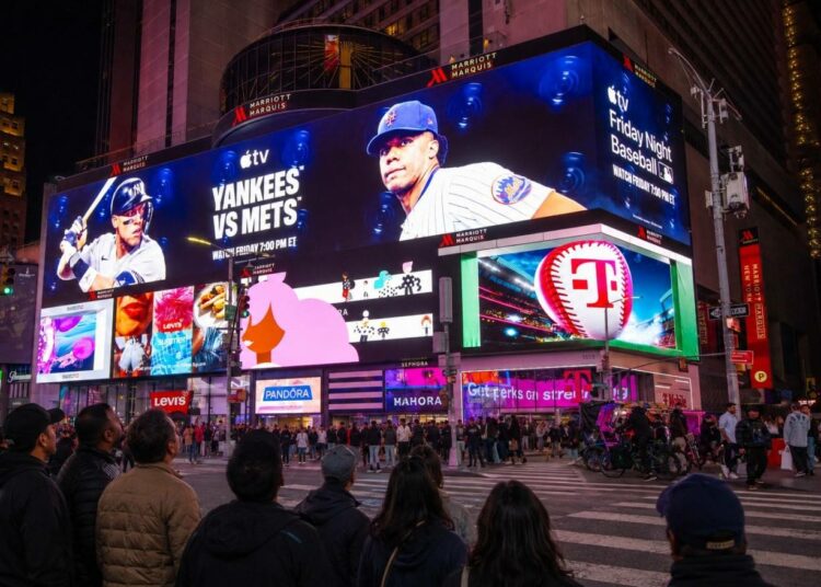 Apple TV+ streams the Yankees-Mets Subway Series game live on a Times Square billboard screen, New York, May 15, 2026.
