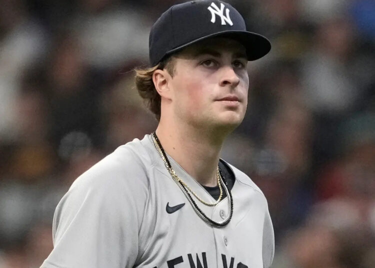 New York Yankees’ Cam Schlittler walks to the dugout during the first inning of a baseball game against the Milwaukee Brewers, Saturday, May 9, 2026, in Milwaukee.