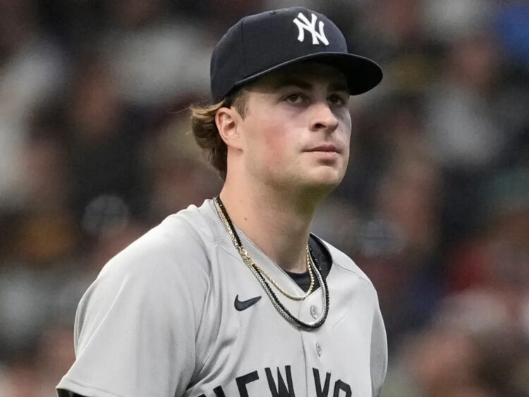 New York Yankees’ Cam Schlittler walks to the dugout during the first inning of a baseball game against the Milwaukee Brewers, Saturday, May 9, 2026, in Milwaukee.
