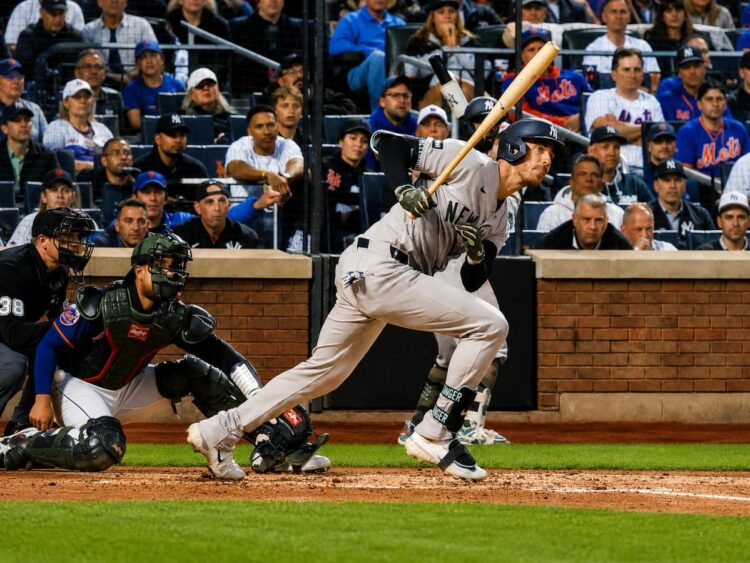 New York Yankees designated hitter Spencer Jones hits an RBI single during the fifth inning of a baseball game against the New York Mets, Friday, May 15, 2026, in New York.