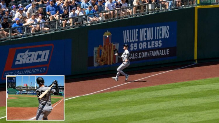 Cody Bellinger hit his first road home run, then crashed into the wall on a foul grab in the Yankees' 4-3 win over the Royals, Kansas City, May 25, 2026.
