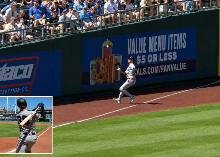 Cody Bellinger hit his first road home run, then crashed into the wall on a foul grab in the Yankees' 4-3 win over the Royals, Kansas City, May 25, 2026.