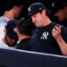 Gerrit Cole reacts in the dugout
