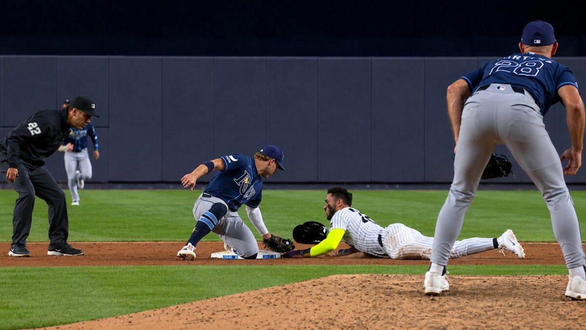 Yankees' Jose Caballero caught stealing bases in 4-2 loss in New York, May 22, 2026.
