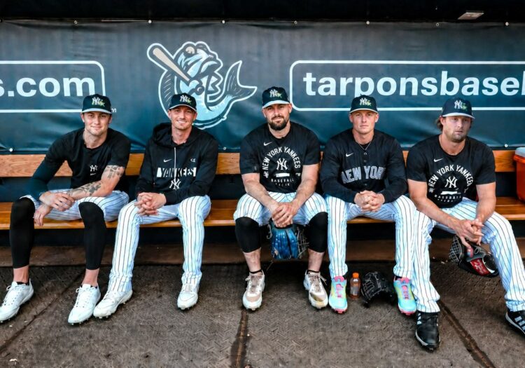 Cam schlittler, Max Fried, Carlos Rodon, Will Warren, and Gerrit Cole at Yankees dugout during the 2026 spring training camp in Tampa.