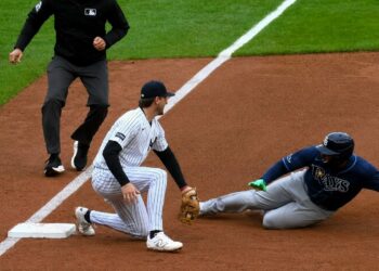 Yankees Ryan McMahon tags out Rays runner Junior Caminero at third base on Cody Bellinger’s heads-up throw during New York’s 2-0 win on May 24, 2026.