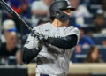 New York Yankees designated hitter Spencer Jones hits an RBI single during the fifth inning of a baseball game against the New York Mets, Friday, May 15, 2026, in New York.