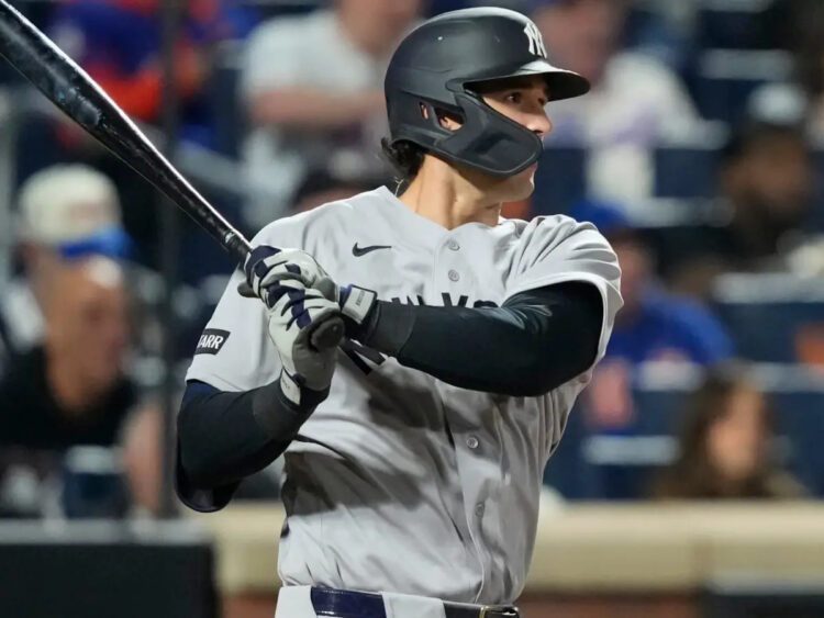 New York Yankees designated hitter Spencer Jones hits an RBI single during the fifth inning of a baseball game against the New York Mets, Friday, May 15, 2026, in New York.