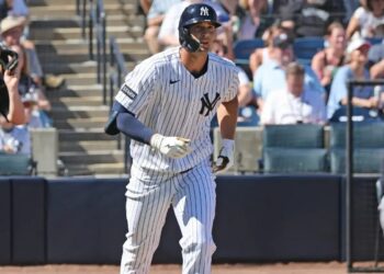 Yankees center fielder Spencer Jones hitting a solo homer during spring training.