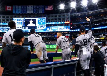 The Yankees dugout erupts in celebration after Ben Rice's go-ahead home run in the ninth in the Yankees' 8-3 win over the Blue Jays, Toronto, June 14, 2026.