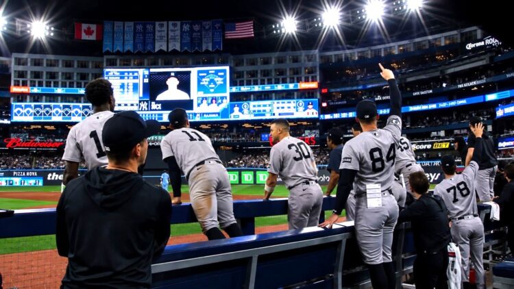The Yankees dugout erupts in celebration after Ben Rice's go-ahead home run in the ninth in the Yankees' 8-3 win over the Blue Jays, Toronto, June 14, 2026.