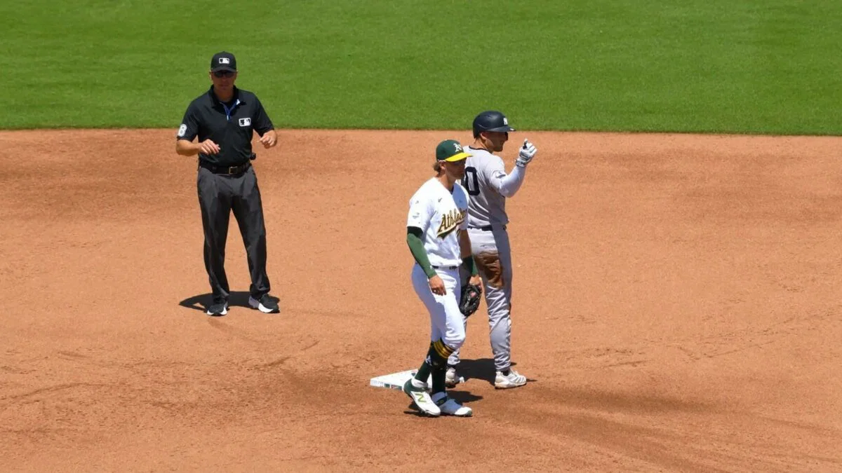 Max Schuemann gestures to dugout after scoring a run in the Yankees' 13-8 win over the A's in Sacramento, May 31, 2026.