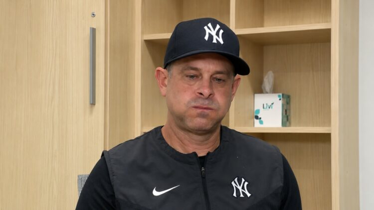 Manager Aaron Boone speaks to reporters after the Yankees' 8-4 win over the Guardians in Cleveland, June 10, 2026.