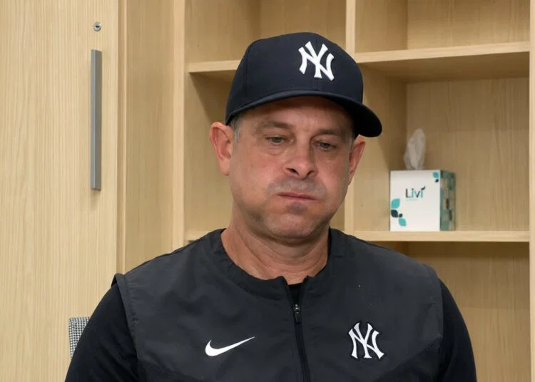 Manager Aaron Boone speaks to reporters after the Yankees' 8-4 win over the Guardians in Cleveland, June 10, 2026.