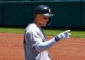 Aaron Judge gestures to Ben Rice after scoring a run in the Yankees' 13-8 win over the A's in Sacramento, May 31, 2026.