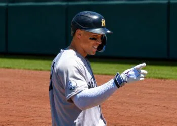 Aaron Judge gestures to Ben Rice after scoring a run in the Yankees' 13-8 win over the A's in Sacramento, May 31, 2026.