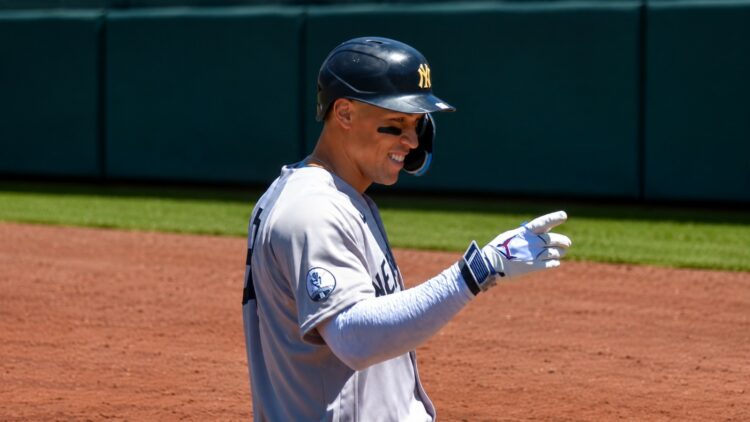 Aaron Judge gestures to Ben Rice after scoring a run in the Yankees' 13-8 win over the A's in Sacramento, May 31, 2026.