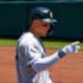 Aaron Judge gestures to Ben Rice after scoring a run in the Yankees' 13-8 win over the A's in Sacramento, May 31, 2026.