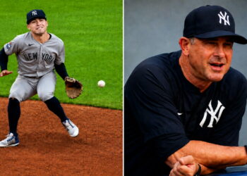Manager Boone reacts to Anthony Volpe's error during the third inning in the Yankees' 3-2 win over the Guardians in Cleveland, June 9, 2026.