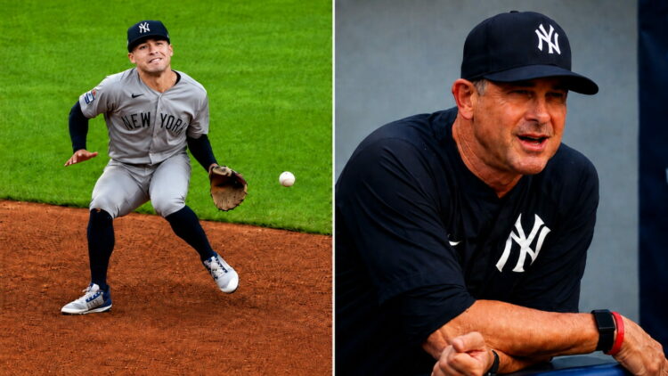 Manager Boone reacts to Anthony Volpe's error during the third inning in the Yankees' 3-2 win over the Guardians in Cleveland, June 9, 2026.
