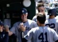 Aaron Judge gestures to Ben Rice after scoring a run in the Yankees' 13-8 win over the A's in Sacramento, May 31, 2026.