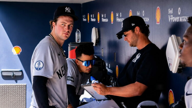 Cam Schlittler is with Gerrit Cole in the dugout after 7-inning gem in the Yankees' 3-1 win over the Blue Jays, Toronto, June 13, 2026.