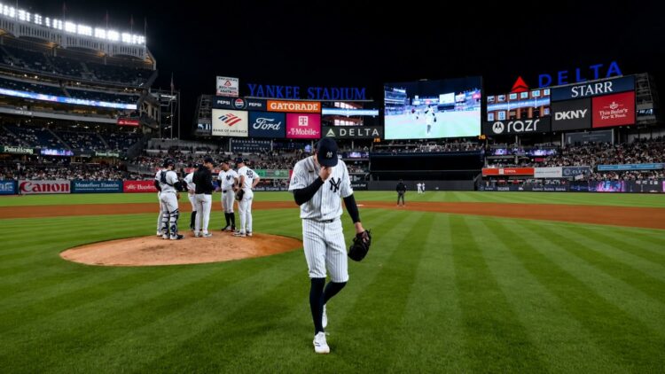 Cam Schlittler heads back to dugout after giving up 5 runs in 4.1 IP in the Yankees' 9-4 loss to the Guardians in New York, June 2, 2026.