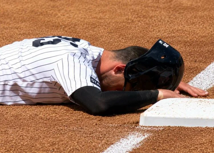 Cody Bellinger reacts after he overslided and was tagged by Ramirez at third base in the Yankees' 2-1 win over the Guardians in New York, June 4, 2026.