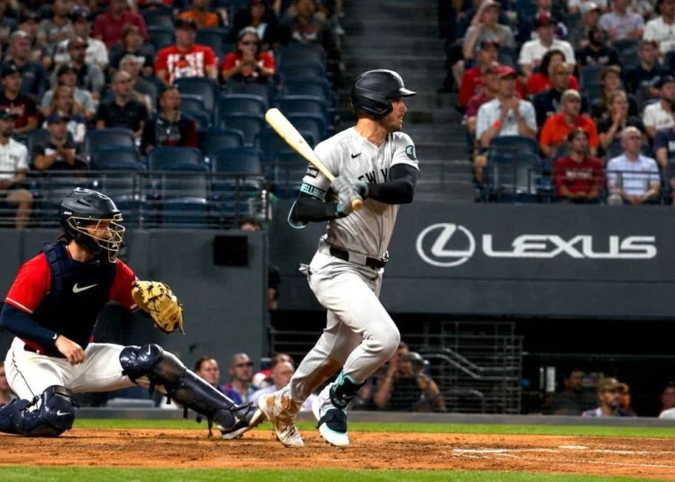 Cody Bellinger hits a two-run single in the 10th inning in the Yankees' 5-7 win over the Guardians in Cleveland, June 08, 2026.