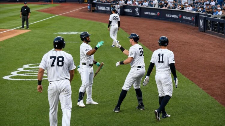 Jasson Dominguez, Ben Rice, Spencer Jones, and Volpe celebrate after Rice's three-run blast in the Yankees' 5-0 win over the Reds, New York, June 19, 2026.