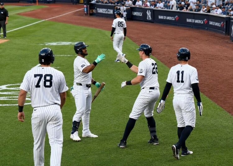 Jasson Dominguez, Ben Rice, Spencer Jones, and Volpe celebrate after Rice's three-run blast in the Yankees' 5-0 win over the Reds, New York, June 19, 2026.