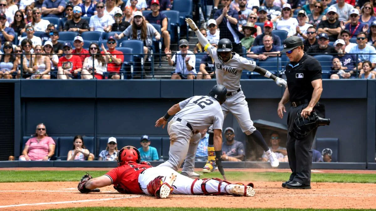 Jazz Chisholm celebrates after Trent Grisham slides into the plate in the sixth in the Yankees' 8-4 win over the Guardians in Cleveland, June 10, 2026.