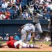 Jazz Chisholm celebrates after Trent Grisham slides into the plate in the sixth in the Yankees' 8-4 win over the Guardians in Cleveland, June 10, 2026.