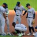 Jazz Chisholm is trying to bury a dirt cam during the Yankees' 5-3 loss to the Tigers, Detroit, Jun 22, 2026.