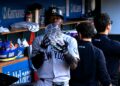 Jazz Chisholm shows up a case of lollipops after hitting a home run in the Yankees' 4-3 win over the Tigers, Detroit, Jun 23, 2026, in apparent reference to outrage over his Blow Pop act a day before.