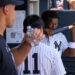 Aaron Judge looks at as Jazz Chisholm kisses his bat in the dugout during the Yankees' 6-1 rout of the Red Sox in New York, June 7, 2026.