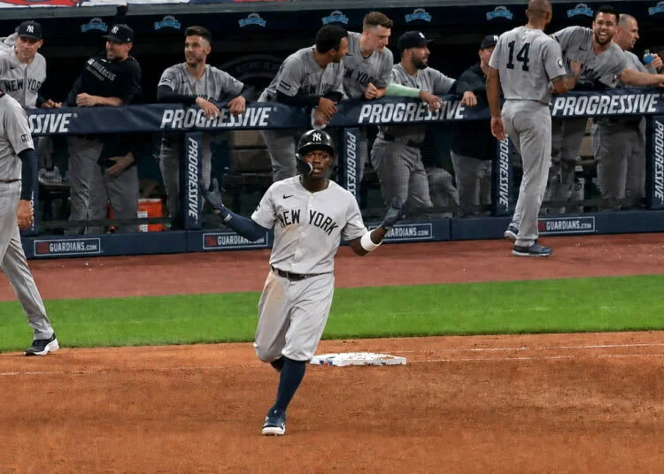 Jazz Chisholm celebrates after his home run in the eight helped the Yankees' beat the Guardians 3-2 in Cleveland, June 9, 2026.