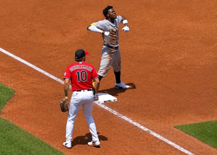 Jazz Chisholm celebrates after a hurried triple in the Yankees' 8-4 win over the Guardians in Cleveland, June 10, 2026.