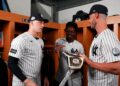 Ben Rivce, Jazz Chisholm, and Cody Bellinger in the clubhouse after the Yankees' 6-1 rout of the Red Sox in New York, June 7, 2026.