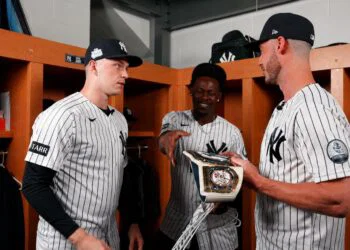 Ben Rivce, Jazz Chisholm, and Cody Bellinger in the clubhouse after the Yankees' 6-1 rout of the Red Sox in New York, June 7, 2026.