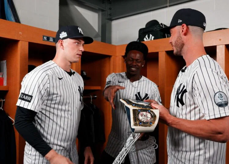 Ben Rivce, Jazz Chisholm, and Cody Bellinger in the clubhouse after the Yankees' 6-1 rout of the Red Sox in New York, June 7, 2026.