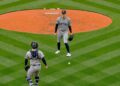 The ball fell between Cam Schlittler and Austin Wells in the second in the Yankees' 6-3 loss to the Red Sox, Boston, Jun 26, 2026.