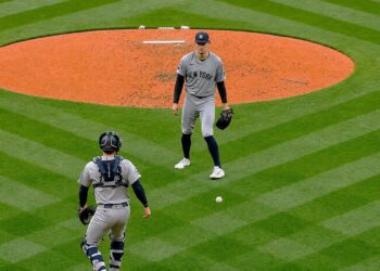 The ball fell between Cam Schlittler and Austin Wells in the second in the Yankees' 6-3 loss to the Red Sox, Boston, Jun 26, 2026.