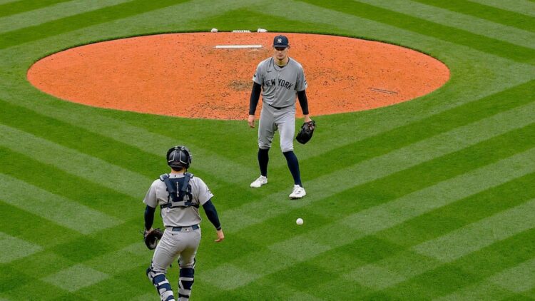 The ball fell between Cam Schlittler and Austin Wells in the second in the Yankees' 6-3 loss to the Red Sox, Boston, Jun 26, 2026.