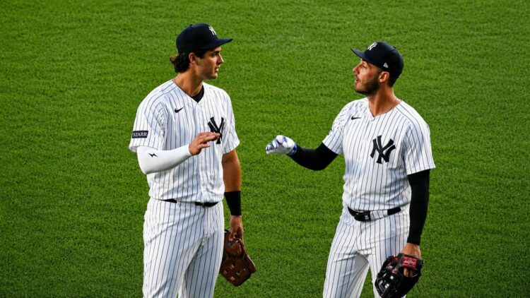 Spencer Jones and Cody Bellinger celebrate after the Yankees' 12-2 win over the White Sox, New York, Jun 16, 2026.