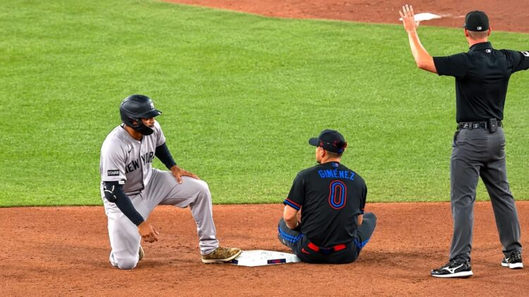 Trent Grisham reacts in pain after a run during the Yankees' 8-5 loss to the Blue Jays on June 12, 2026.